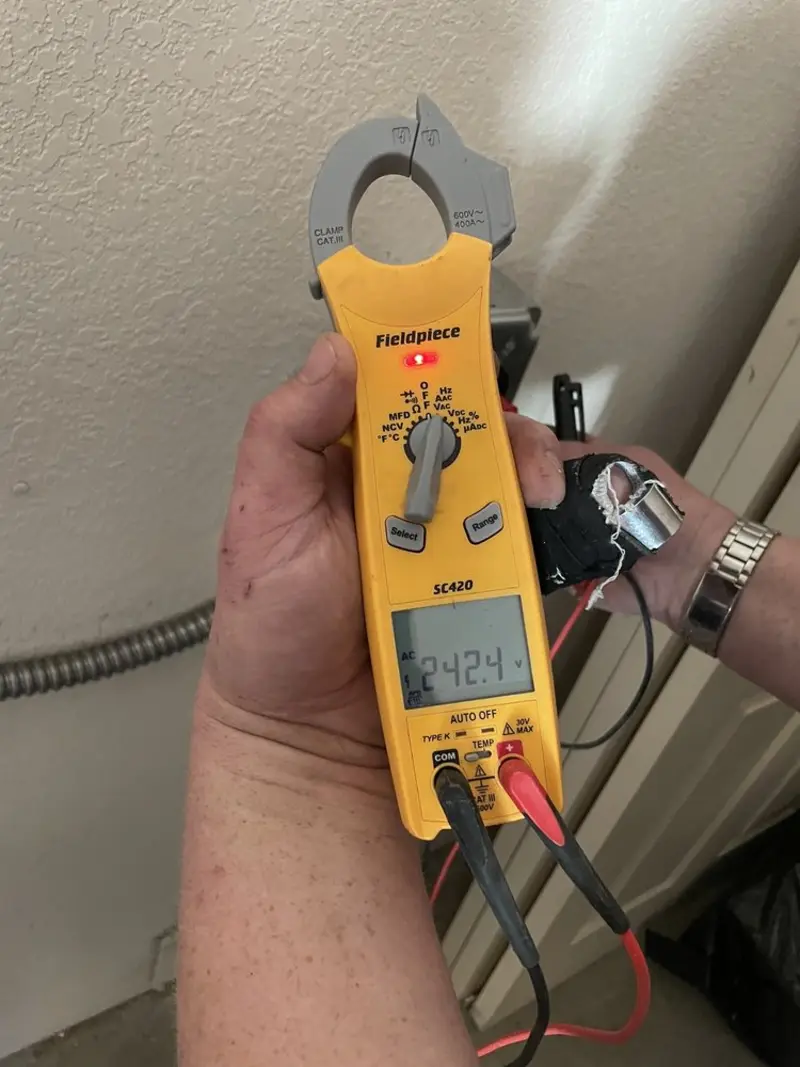 Voltage testing with clamp meter during Aluminum Wiring Replacement in Coralville